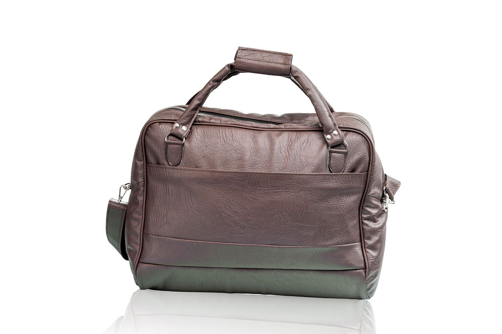 Denri Africa's brown Voyage Travel Bag. Classic travel duffle, premium vegan leather overnight bag, perfect for business or leisure travel.